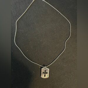 Elegant Silver Cross Necklace with Green Accent